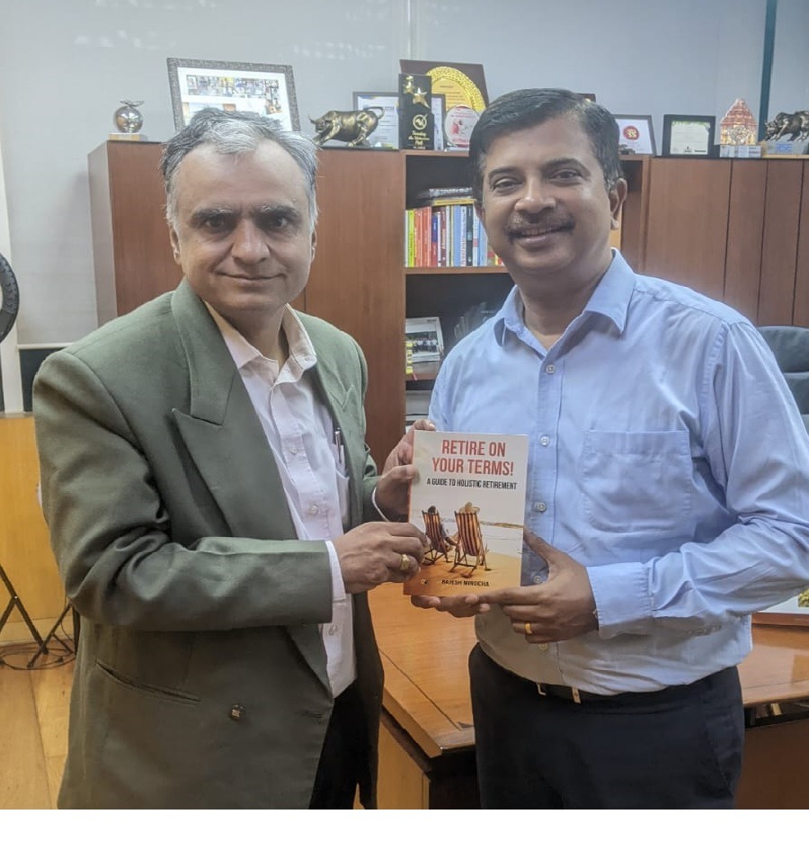 Presenting my Book, Retire on your terms, to Mr Swarup Mohanty